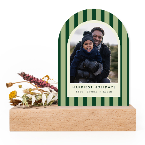 Wooden block with dried flowers and arched forex card