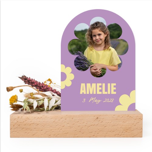 Wooden block with dried flowers and arched forex card