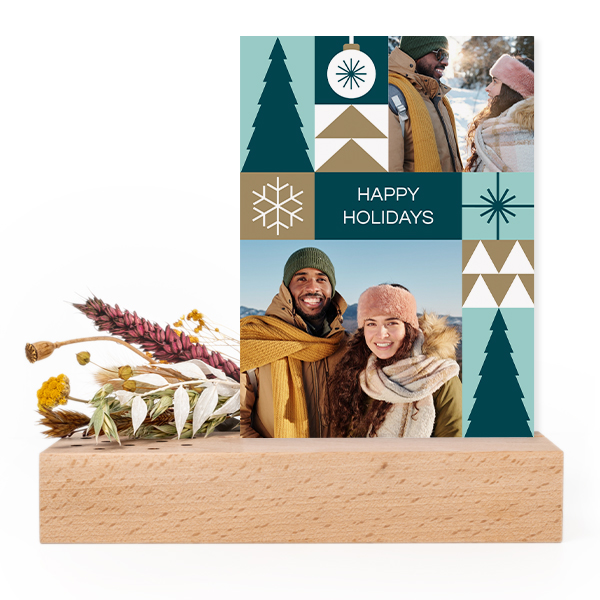 Forex card in wooden stand with dried flowers