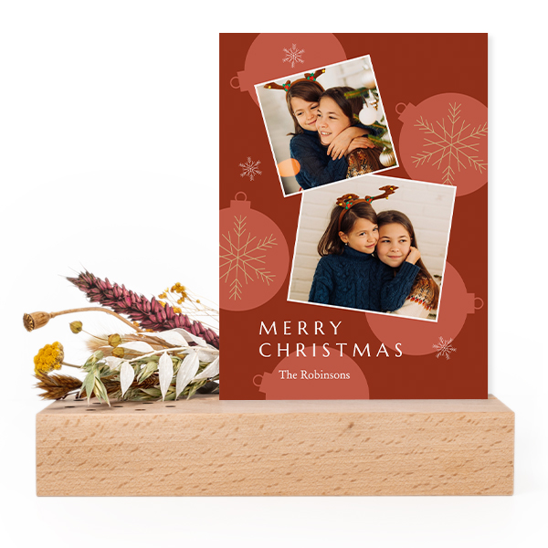 Forex card in wooden stand with dried flowers