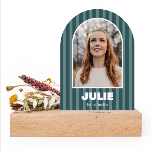 Wooden block with print, dried flowers and arched forex card