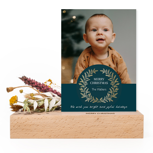 Wooden block with print, dried flowers and forex card
