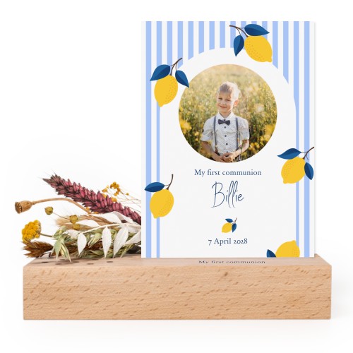 Wooden block with print, dried flowers and forex card