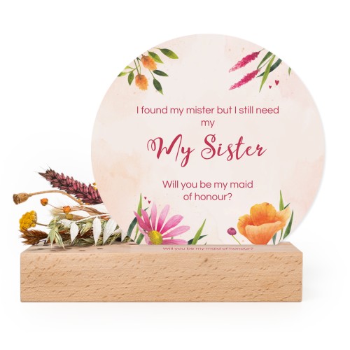 Wooden block with print, dried flowers and rounded forex card Wooden block with print, dried flowers and rounded forex card