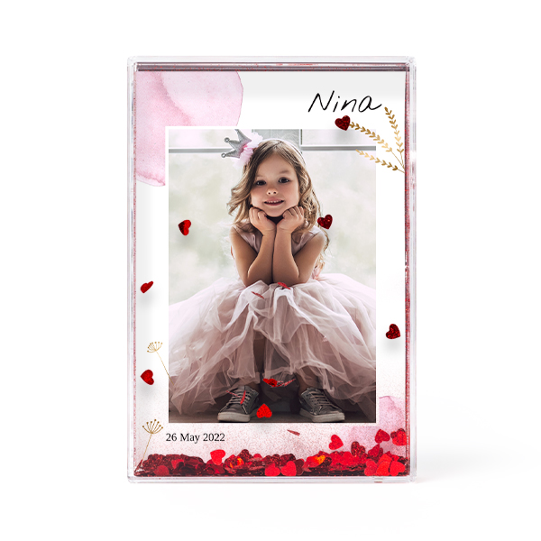 Photo frame with heart confetti