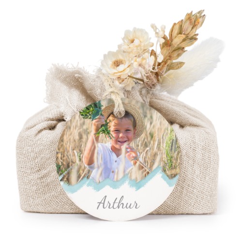 Såper i beige stoffinnpakninger med rundt merke (sett à 6)