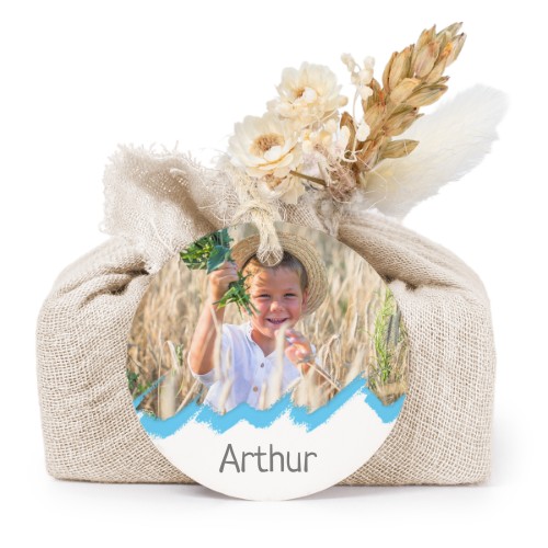 Såper i beige stoffinnpakninger med rundt merke (sett à 6)