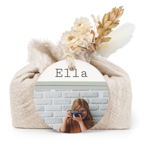 Såper i beige stoffinnpakninger med rundt merke (sett à 6)