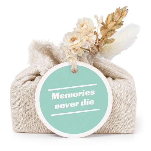 Såper i beige stoffinnpakninger med rundt merke (sett à 6)