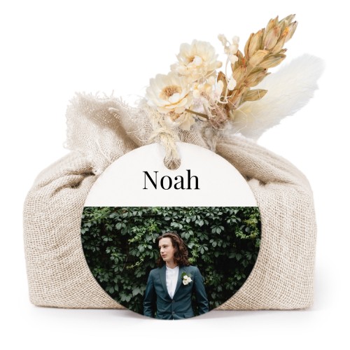 Såper i beige stoffinnpakninger med rundt merke (sett à 6)