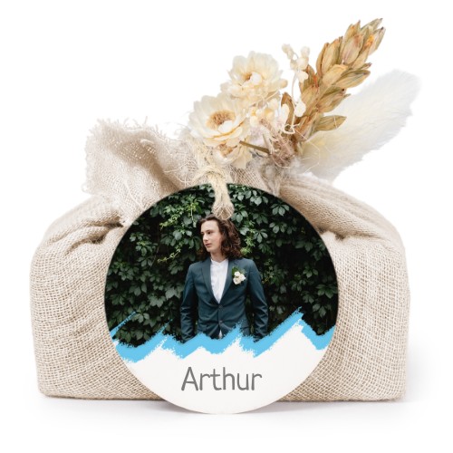 Såper i beige stoffinnpakninger med rundt merke (sett à 6)