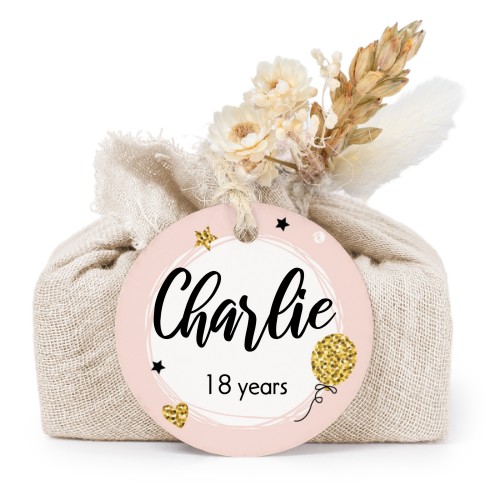 Såper i beige stoffinnpakninger med rundt merke (sett à 6)