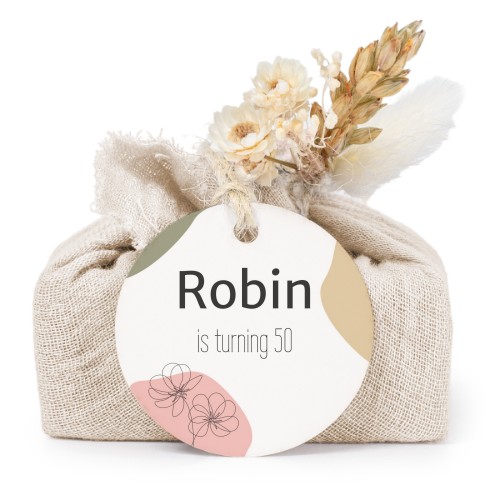 Såper i beige stoffinnpakninger med rundt merke (sett à 6)