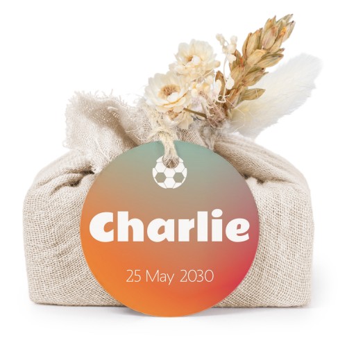 Såper i beige stoffinnpakninger med rundt merke (sett à 6)