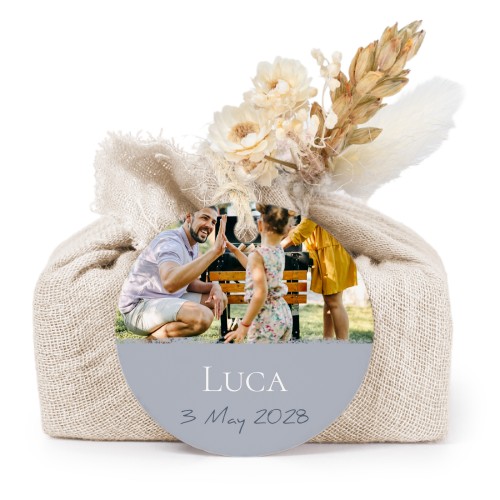 Såper i beige stoffinnpakninger med rundt merke (sett à 6)