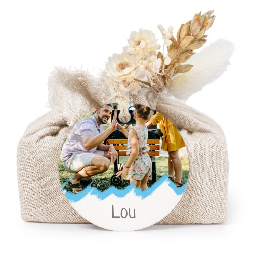 Såper i beige stoffinnpakninger med rundt merke (sett à 6)