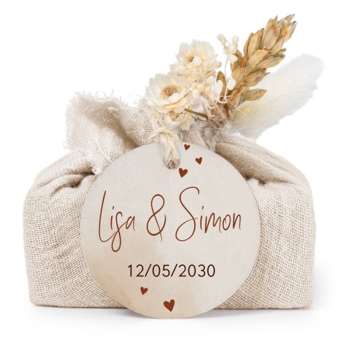 Såper i beige stoffinnpakninger med rundt merke (sett à 6)