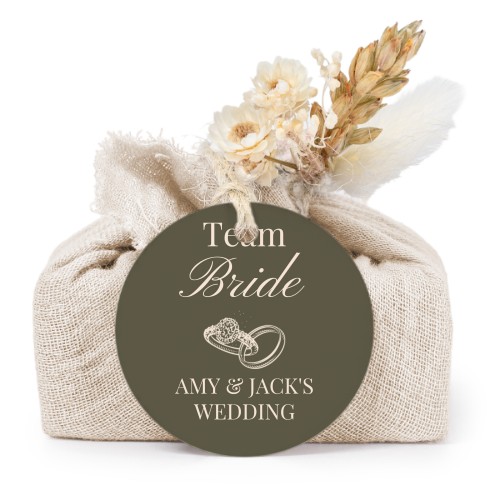 Såper i beige stoffinnpakninger med rundt merke (sett à 6)