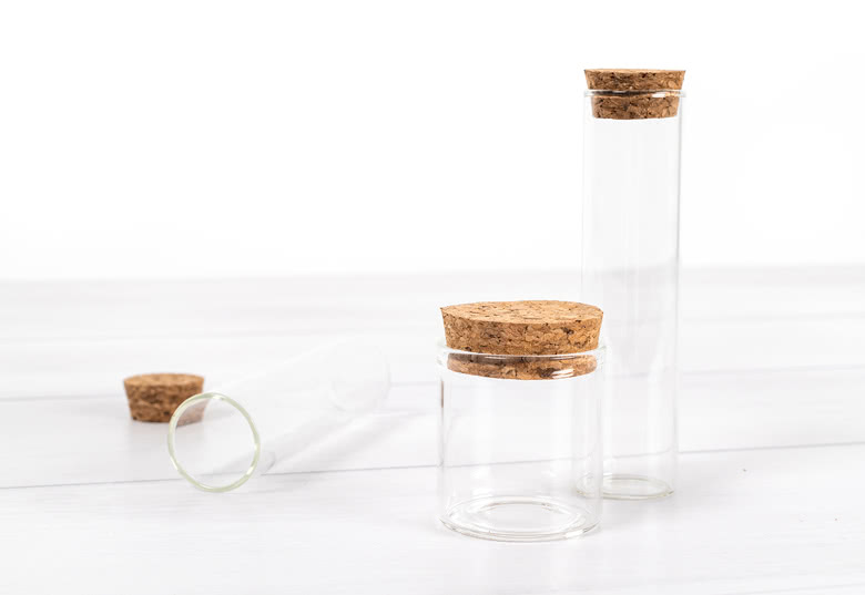 Glass jars and tubes with bath salt - set of 12