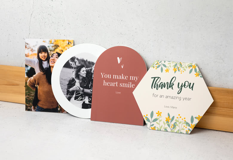 Personalised photo card with a colourful abstract background, featuring a couple's photo and the text "You mean the world to me".
