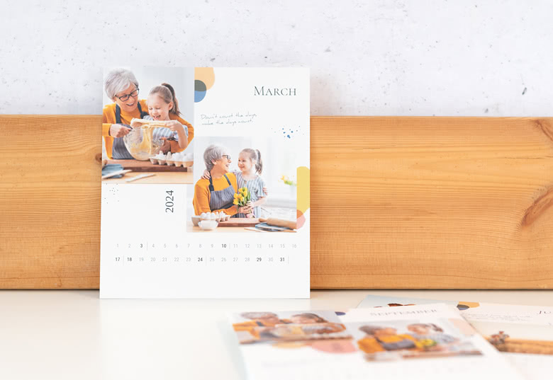 Personalised calendar refill card for March 2024, featuring photos of a woman and girl baking, with colourful geometric accents.