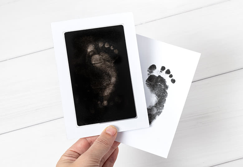 Photo frame with foot & hand print