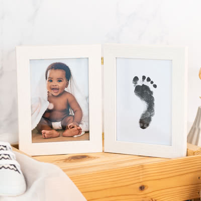 Photo frame with foot & hand print