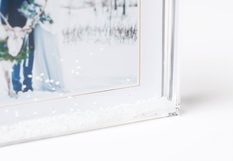 Photo frame with snow