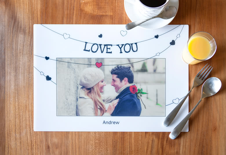 Personalised placemat with "LOVE YOU" text, heart details, and a custom photo.