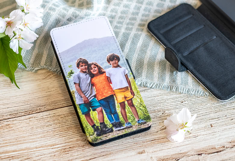 Personalised Samsung wallet case with a photo of three children on the front.