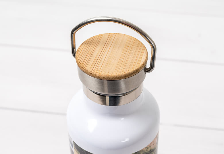 White personalised thermos with a bamboo lid and stainless steel handle, featuring a custom photo design on the body.