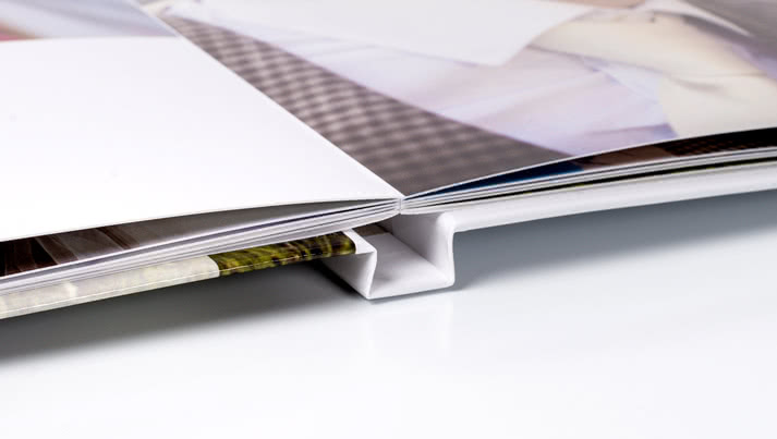 Buy a Photo Book with a hard cover and get Lay-Flat binding at no extra cost